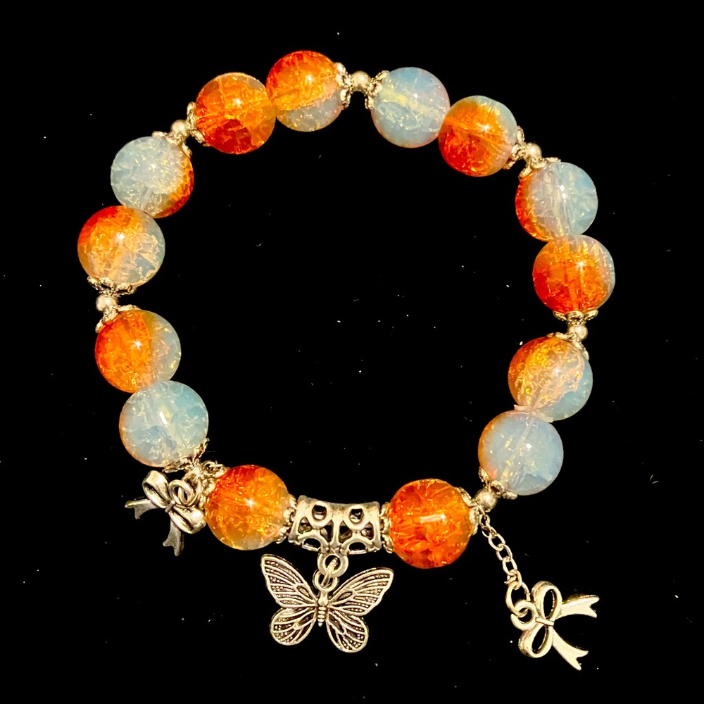 Orange and blue beaded bracelet with a butterfly charm #fairycore 
18cm/7.09in